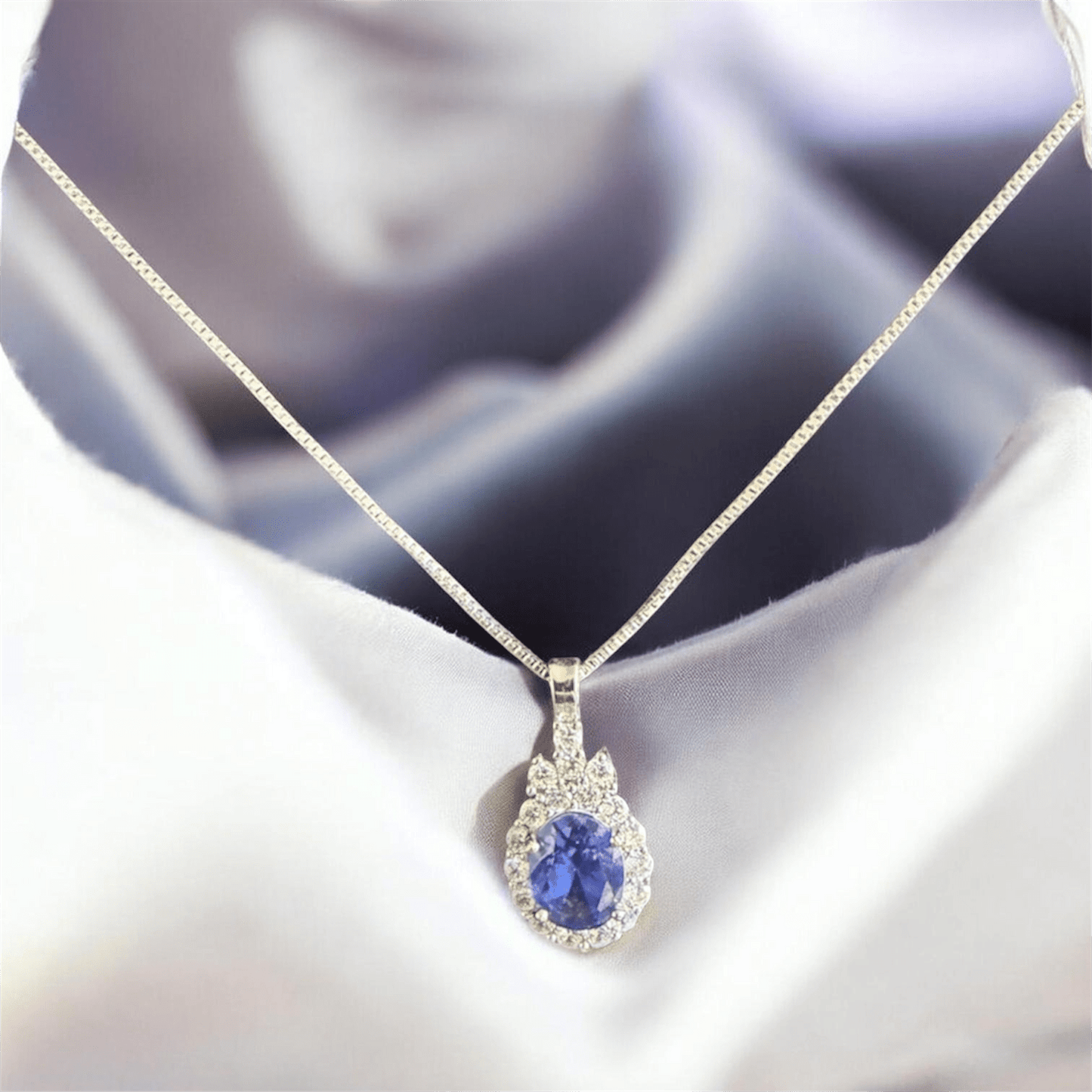 Pendentif sertie tanzanite bleu - L'écho éternel du feu